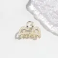 Close-up detail of mini alloy hair claw clip adorned with delicate pearls for hair chic. - 3cm / Artificial Pearl Ears Shape