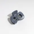 Detail view of the grey blue bow hair claw with silver splatter spots for everyday use. - Bow / Dark Gray