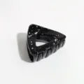 Black triangle hair claw clip with white paint splatter design, stylish hair accessory detail. - Triangle / Black