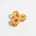 Detail shot of a cute yellow butterfly hair claw with silver speckles for daily elegant styling. - Small Bowknot / Yellow