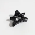 Black star hair claw clip detail shot showcasing silver glitter speckles and sturdy teeth. - Star / Black