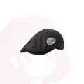 Detail shot of the dark grey newsboy cap featuring a side embroidered patch and contrast brim. - M (56-58cm) / Gray