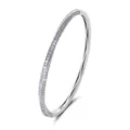 Close-up detail of silver twisted Mobius strip pave diamond bangle bracelet sparkle. - Rotating Mobius Loop (With GRA Certificate) / 925 Silver / Silver