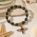 Elegante pulsera de rosario negra con colgante de cruz alada dorada para regalos bautizo. - Negro (ZJ17281)