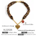Trendy leopard print silk scarf necklace featuring a large heart pendant in gold finish - Leopard Heart Resin Bead Necklace (XL32026)
