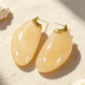 Vintage-style cream resin oval drop earrings with elegant gold-toned metal accents - Orange Yellow Textured Resin Style (2609090B)