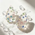 Vintage teardrop earrings with colorful rhinestones set on a snowy white background - Colorful Rhinestone Teardrop Style (2609092B)