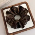 Stylish leopard print scrunchie with faux leather detail for women's hair styling - European and American Retro Style (27666) / Leopard and Leather Splicing