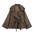 Detailed view of stylish brown loose trench coat with wide lapel and belted waist - S / Tops / Dark Brown
