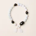 Elegant natural jade beaded bracelet featuring a shell flower and white teardrop pendants. - Barrel Bead Shell Flower Waterdrop Bracelet / 7.5mm / Black