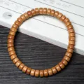 Natural brown sandalwood bracelet featuring tablet-shaped wooden beads for meditation - Standard 5x8mm / South American Boxwood