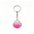 Pink glitter seashell keychain detail showing the sparkling resin charm and metal ring. - Rose Red