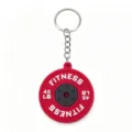 Mini PVC barbell weight plate keychain, fitness gym gift accessory, red metal keyring. - Red