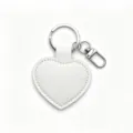 White PU leather heart keychain with silver metal ring and lobster clasp for gifts. - White