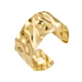Close-up of the wide open metal cuff bracelet featuring unique irregular melted texture details. - Wavy Arm Cuff / Medium KC Gold