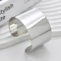 Wide silver metallic cuff bracelet with open design, stylish fashion street jewelry. - Flat Arm Cuff / White K Silver