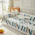 Housse de canapé de style nordique avec motif de coups de pinceau et glands décoratifs - 130x180cm (Fauteuil) / Peinture à Rayures