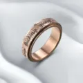 Stainless steel spinner ring for men with pearl sand finish and motivational text. - Rose Gold