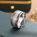 Close-up detail view of the stylish stainless steel ring featuring unique wood grain and textured inlay. - US Size 7 / Rime Pattern Ring