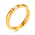 Minimalist 18k gold plated stainless steel ring featuring a chic baguette pink zircon stone. - Champagne (November)