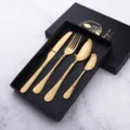 Gold stainless steel flatware cutlery set with knife fork and spoon in black gift box. - 4-Piece Set in Box / Titanium Gold