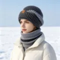 Outdoor warm knitted beanie and neck warmer set worn by a woman in a snowy scene - One Size / Set / Gray