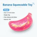 Jouet sensoriel banane rose à presser avec paillettes et maltose, jouet anti-stress en TPR - 7.5*3.8*2.8cm / Rose