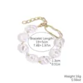 Elegante pulsera de perlas barrocas con cuentas blancas irregulares y cadena dorada ajustable. - Estilo Perla Irregular Grande (S2006-2)