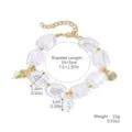 Elegante pulsera de perlas barrocas con dijes de concha dorados y cadena ajustable - Estilo Estrella de Mar y Caracol (S2412-22)