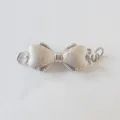 Silver bow necklace clasp detail view, premium metallic DIY jewelry accessory component. - 1-Ring / White