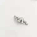 Silver lantern ball clasp connector for jewelry making, perfect for DIY bracelets and necklaces. - White