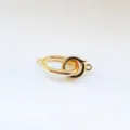 Close-up of gold metal jewelry clasp, ideal for DIY necklaces and bracelets connector. - L / Gold