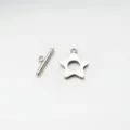 Close-up detail shot of stainless steel star OT clasp toggle components for DIY jewelry. - Pentagram White