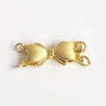 Close-up of gold-plated copper bow jewelry clasp, ideal for DIY bracelets and necklaces. - 2-Ring / Gold