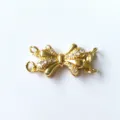Gold plated double strand rhinestone bow necklace clasp DIY jewelry accessory detail view. - Double Rings / Gold
