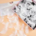 White fluffy craft feathers for DIY wedding party decoration and balloon filling. - White