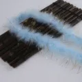 Light blue fluffy feather boa with gold tinsel, perfect for craft, gift wrapping, and party decor. - Light Sky Blue