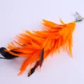 Orange and black feather hair clip, handmade wire flower hair accessory for stage show. - Orange