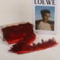 Red and black speckled feather trim with red fabric tape for DIY clothing accessories 1m - Red