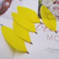 Yellow feather DIY jewelry charms with metal loop clips for handmade fashion accessories - Yellow