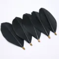 Black DIY craft feathers with metal clip loops for handmade jewelry apparel accessories. - Black
