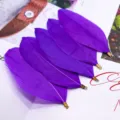 Wholesale DIY feather jewelry accessories with metal clips, purple swan feather crafts. - Deep purple