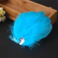 Blue feather hair clip with crystal accent, perfect for kids dance performance hair accessories. - Lake Blue
