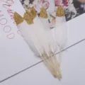 Basteln weiße Gänsefedern mit goldenen Glitzerspitzen für handgefertigte Zubehördekoration - Weiße Federn mit goldenen Glitzerspitzen