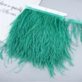 Ostrich feather trim in vibrant green, perfect for DIY sewing, dress fringe, and wedding crafts. - 38