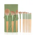 10-piece makeup brush set with green storage pouch, wooden handles and soft bristles. - Makeup Brush Set + Storage Bag