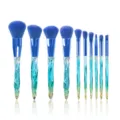 10-piece professional crystal makeup brush set with soft blue bristles and gradient handle. - Blue