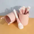 12-piece pink makeup brush set with leather holder, professional cosmetic tools for beauty. - Twelve Pink Brushes (Wooden Handle) And Pink Cylinder Holder