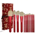 12-piece makeup brush set with red handles and cherry blossom roll pouch for easy portability. - Red Flower Bag - Rose Red Handle / 12 Pieces / Red