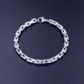 Stainless steel Cuban link bracelet for men, smooth curved design, durable fashion jewelry. - Motorcycle Link Style (5mm) / 18cm Length (Lobster Clasp) / Silver